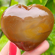 Carnelian heart in the palm of 155 grams