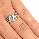 Prsten broušený modrý topaz Ag 925/1000+Rh