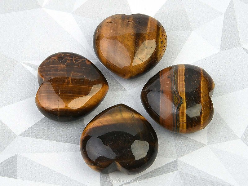 Tiger's eye heart in the palm