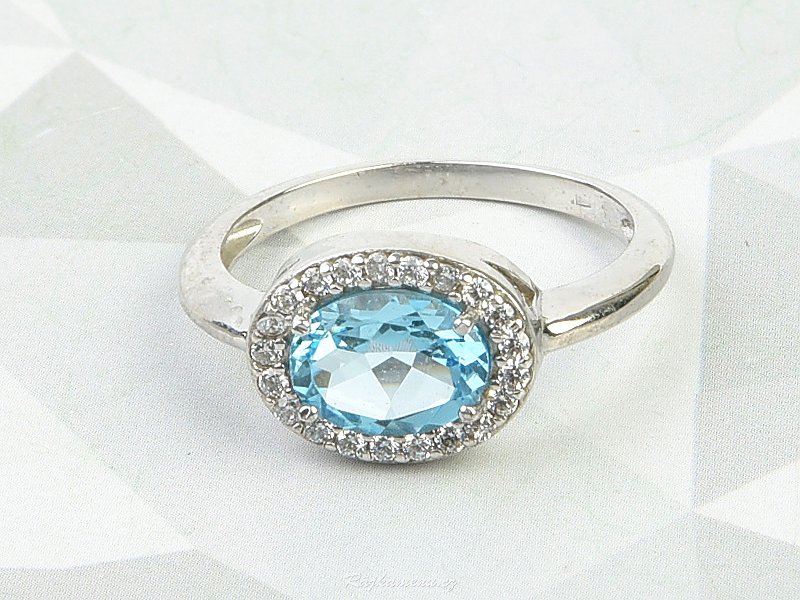Oválný prsten modrý topaz + zirkony Ag 925/1000