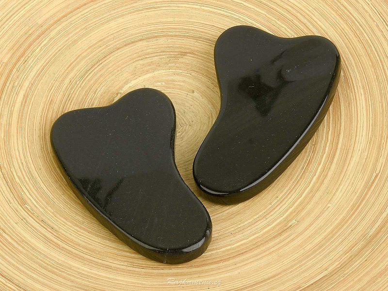 Guasha made of black obsidian for massages