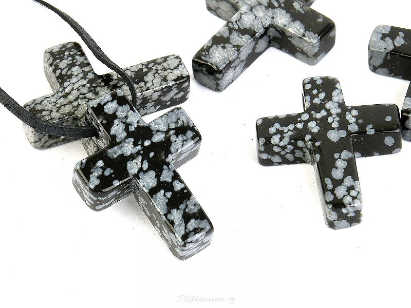 Pendant cross made of flake obsidian on the cuticle