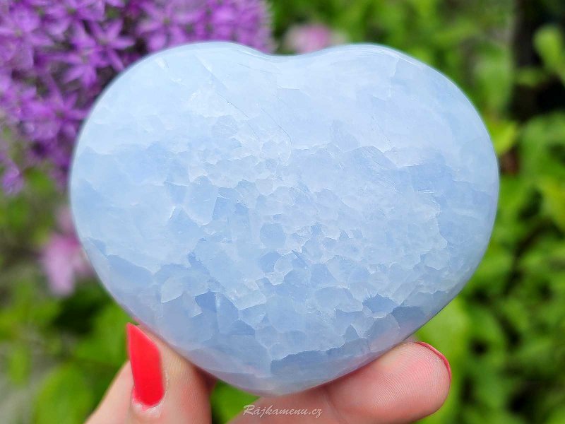 Blue calcite heart in the palm 7.0 cm