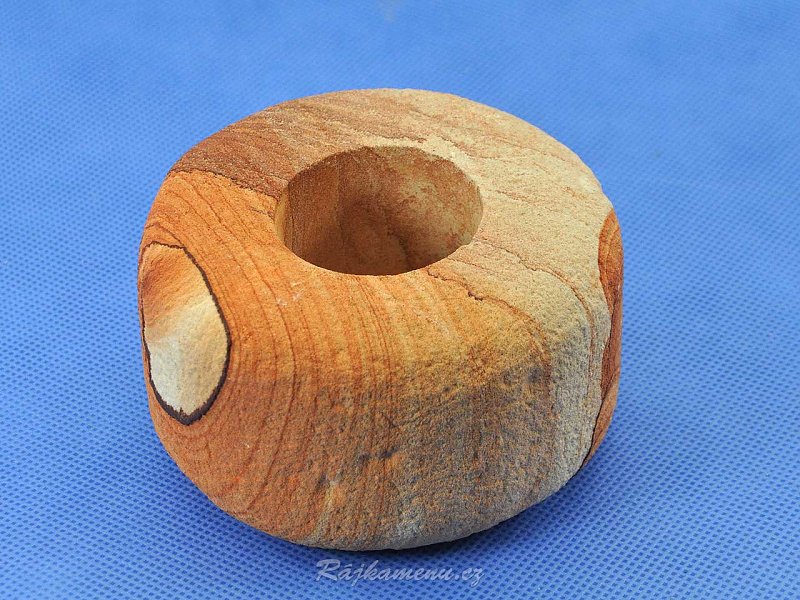 Round candlestick made of sandstone