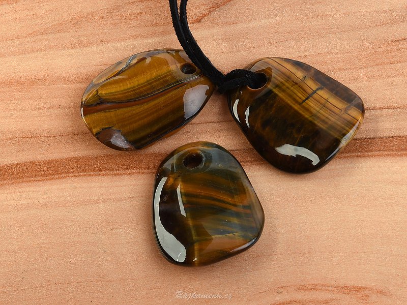 Shaped pendant on the skin, tiger's eye