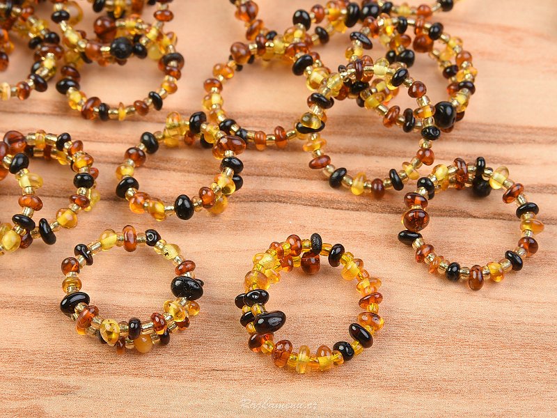 Beaded ring with amber shades mix