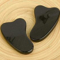 Guasha made of black obsidian for massages