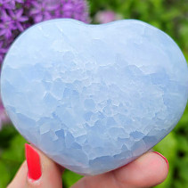 Blue calcite heart in the palm 7.0 cm