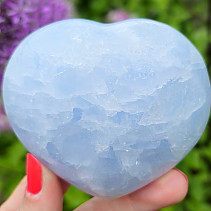 Heart in the palm of blue calcite