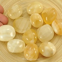 Calcite yellow smooth stone