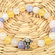 Ball bracelet with little angel mix of stones