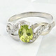 Oval ring of olivine and zircons Ag 925/1000 standard cut