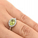 Olivine oval ring with zircons Ag 925/1000