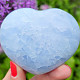 Blue calcite heart in the palm 7.0 cm
