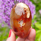 Heart made of carnelian stone in the palm of 6.1 cm