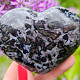A gabbro heart just fits in the palm of 5.9 cm
