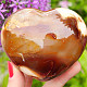 Carnelian heart in hand 7.4 cm