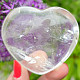 Smooth crystal heart in the hand 6.6 cm