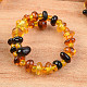 Beaded ring with amber shades mix